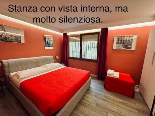 Letto o letti in una camera di Dimora del Teatro