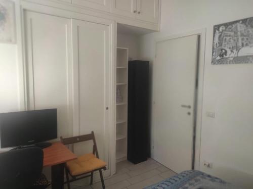 TV a/nebo společenská místnost v ubytování Pineta Sacchetti Camera