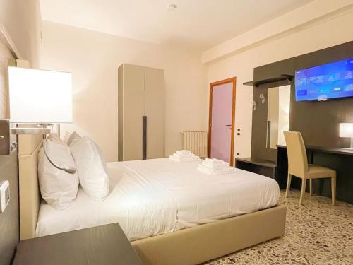 Una cama o camas en una habitación de Brain Loft Pagani