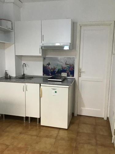 Η κουζίνα ή μικρή κουζίνα στο Apartamentos Playamar II