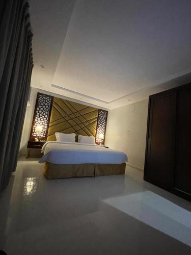 Letto o letti in una camera di شقق جيهان الخاصة