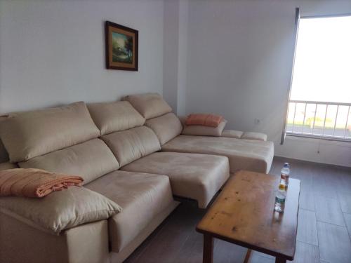 Ein Sitzbereich in der Unterkunft Apartamento reformado con piscina y vistas