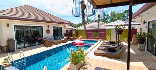 a house with a swimming pool with a house at Sila Thai Pool Villa1 in Ao Nang Beach