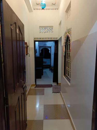 a hallway of a house with a door at The Royal Lake View Villa in Udaipur