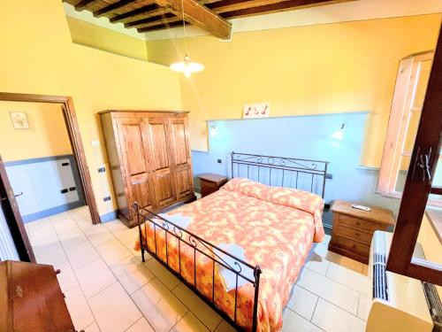 Posteľ alebo postele v izbe v ubytovaní Spoleto apt 5 guests - With infinity pool, extensive grounds
