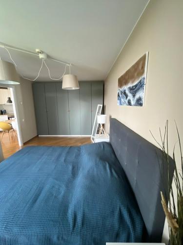 Postel nebo postele na pokoji v ubytování Elija Sea & leisure appartments Sventoji