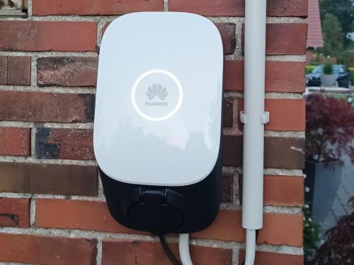 a water heater attached to a brick wall at Haus Angelika in Berumbur