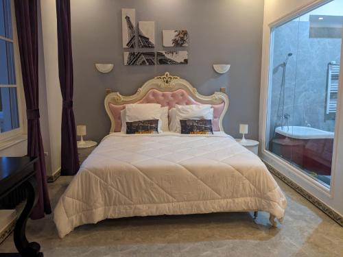 Ένα ή περισσότερα κρεβάτια σε δωμάτιο στο Château de la Rocherie