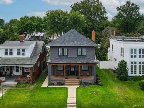 an aerial view of a house with a yard at Sunset Stay at 608 in Wormleysburg