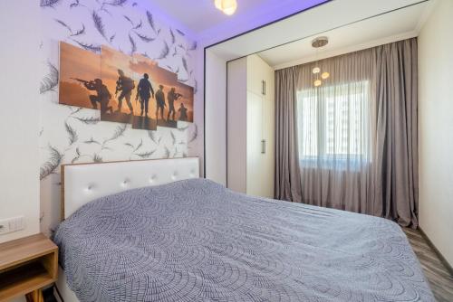 Una cama o camas en una habitación de Cozy Apartment