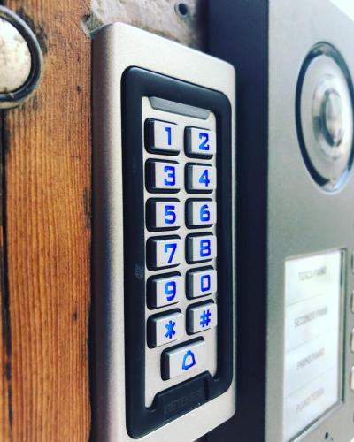 a close up of a remote control on a wall at BB Diesis in Ferrazzano
