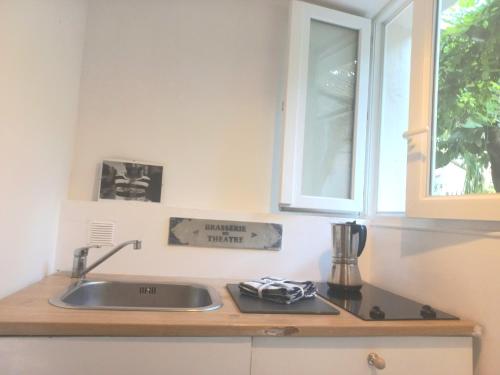 Una cocina o zona de cocina en Le Nid