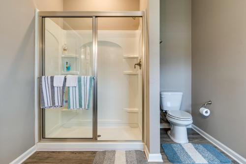 a bathroom with a shower and a toilet at Cozy Cartersburg Home about 14 Mi to Indianapolis in Cartersburg