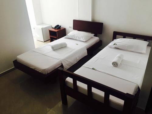 Postel nebo postele na pokoji v ubytování Hotel Preferencial Class