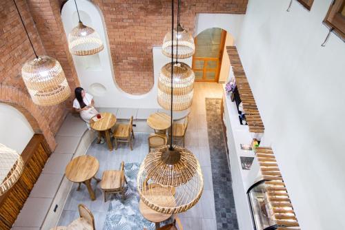 an overhead view of a room with tables and chairs at PS23 Residence in Hat Yai