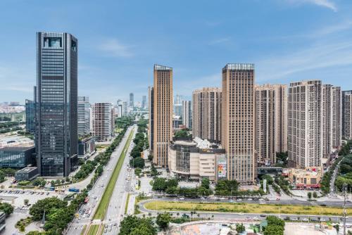 an aerial view of a city with tall buildings at Pazhou Angda International Aparthotel Canton Fair Branch in Guangzhou