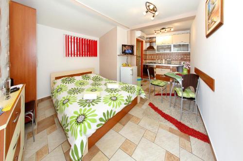 Postel nebo postele na pokoji v ubytování Apartments Melita