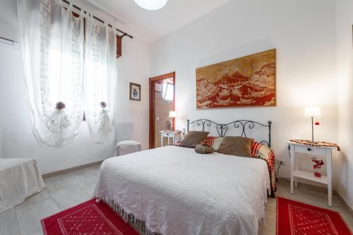 Letto o letti in una camera di Villa Rita