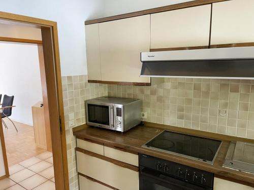 Η κουζίνα ή μικρή κουζίνα στο Gemütliche Apartments mit Balkon