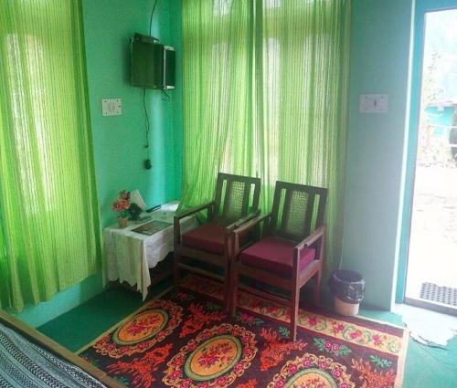 Μια τηλεόραση ή/και κέντρο ψυχαγωγίας στο StayApart Shruti Guest House