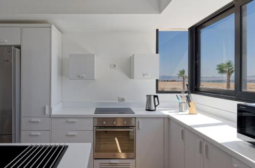Η κουζίνα ή μικρή κουζίνα στο VESTA - Soma Bay Residence