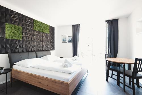 Postel nebo postele na pokoji v ubytování Villa Gall