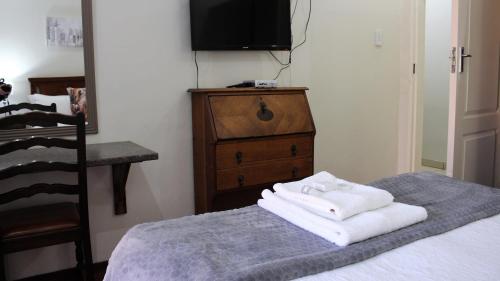 Ένα ή περισσότερα κρεβάτια σε δωμάτιο στο Accommodation at Potch Guesthouse