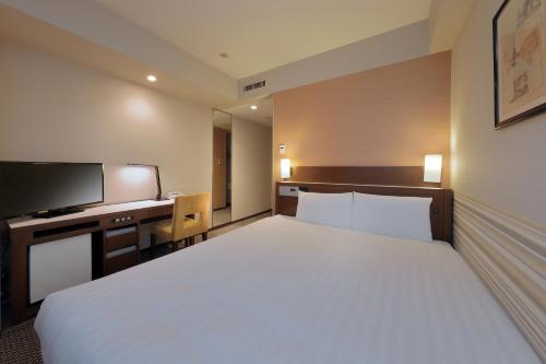 Katil atau katil-katil dalam bilik di Keio Presso Inn Shinjuku