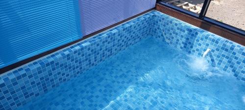 an overhead view of a swimming pool at Hamdeok Pool Villa Ferrari in Jeju