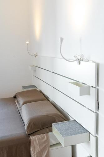 Letto o letti in una camera di Casa vacanze frate Elia - A 50 mt dalla Basilica di San Francesco