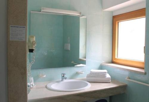 Koupelna v ubytování Hotel Villa Campana