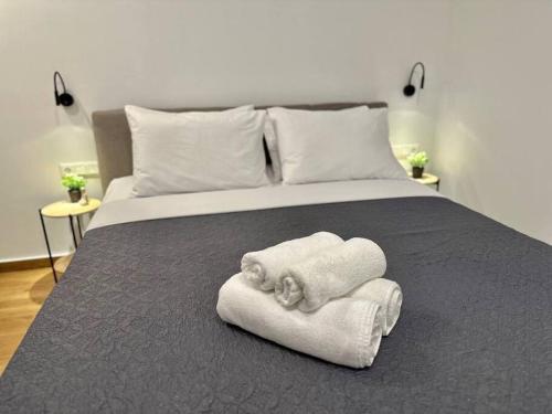 Ένα ή περισσότερα κρεβάτια σε δωμάτιο στο Relax Home in Moschato 2 vipgreece