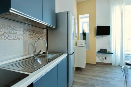 Una cocina o zona de cocina en Etta Suite - Close Vatican Museum