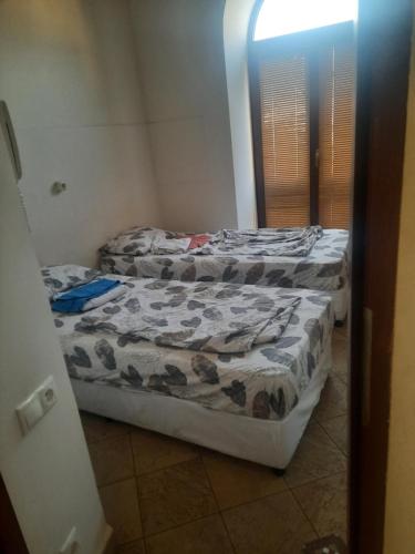 Ένα ή περισσότερα κρεβάτια σε δωμάτιο στο Tumanyan Studio