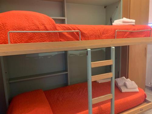 a couple of bunk beds in a room at Appartamento La Casa di Anna in San Severo