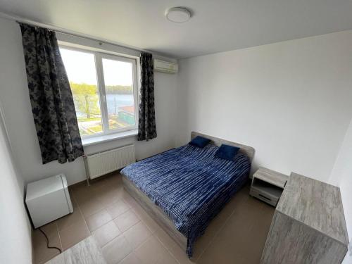 Postel nebo postele na pokoji v ubytování Hotel Burevisnyk (Буревісник)