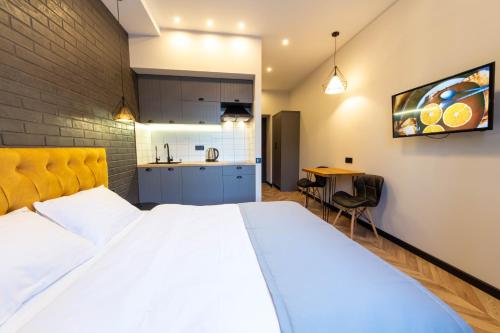Ένα ή περισσότερα κρεβάτια σε δωμάτιο στο Self Check-in Apartments