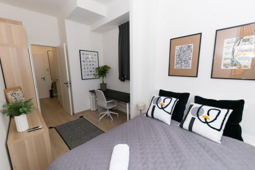 Posteľ alebo postele v izbe v ubytovaní Madách Fox Apartment