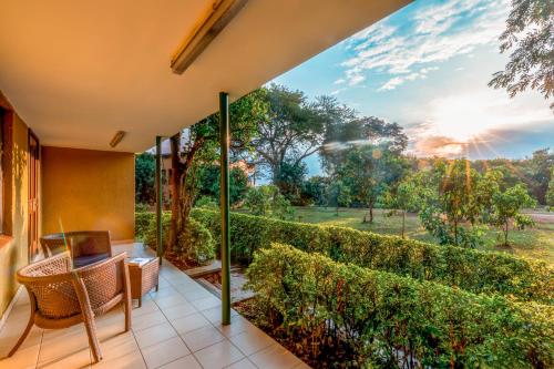 a view from the balcony of a house with a view at Chobe Safari Lodge in Kamdini