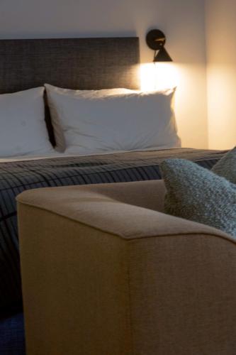Ένα ή περισσότερα κρεβάτια σε δωμάτιο στο LIVINGWAY Roco