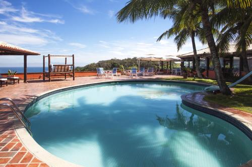 Kolam renang di atau di dekat Colonna Galapagos Garden Hotel