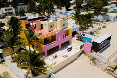 an aerial view of a house on the beach at Hotel Flamingos Inn in Chuburná