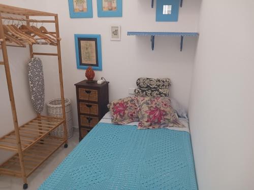 a bedroom with a bed and a bunk bed at Habitación privada con baño. in Cádiz