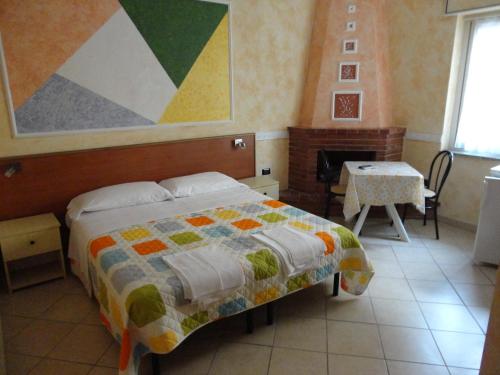 Кровать или кровати в номере Pensione Affittacamere Miriam