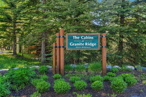 a sign for the gardens of caroline ridge at 3137 Arrowhead in Teton Village