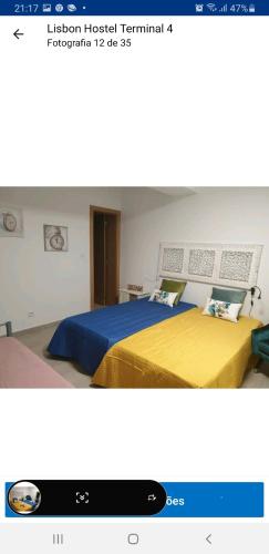 Ένα ή περισσότερα κρεβάτια σε δωμάτιο στο Lisbon Hostel Terminal 4