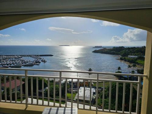 a view of the ocean from a balcony at Boricua Realty VIP Luxury Ocean Front Penthouse 3 Bedrooms 3 Bathrooms 2 Levels in Fajardo