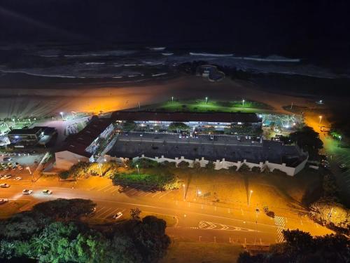 an aerial view of a city at night at Durban Holiday Apartments , 1901 on High Tide in Amanzimtoti