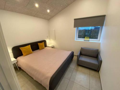 Katil atau katil-katil dalam bilik di Small Rica house in the center in Billund