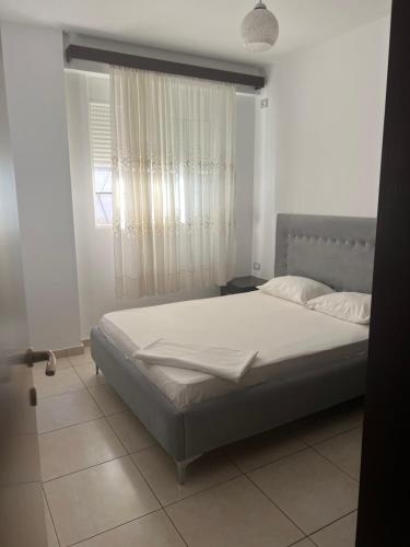 Llit o llits en una habitació de Adea Apartament